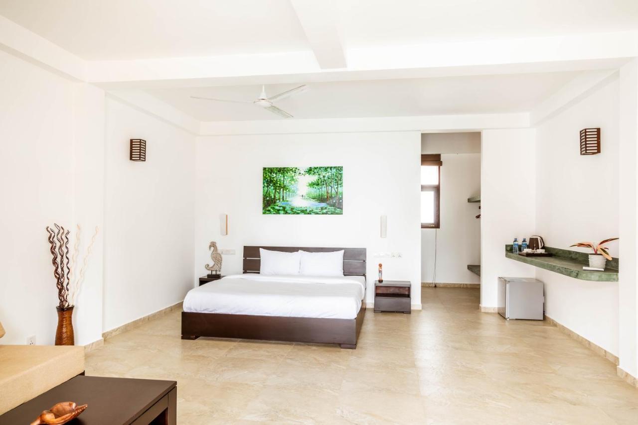 Green Parrot Beach Resort تانجالي المظهر الخارجي الصورة